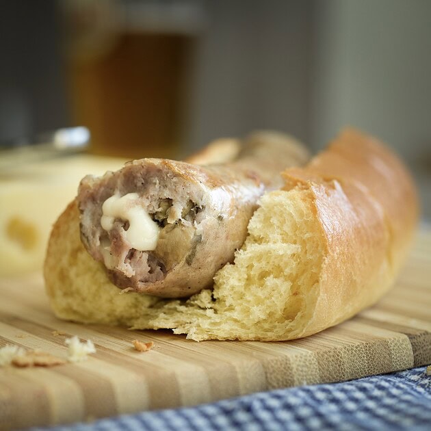 Mushroom Swiss bratwurst in a bun with mushrooms and Swiss cheese